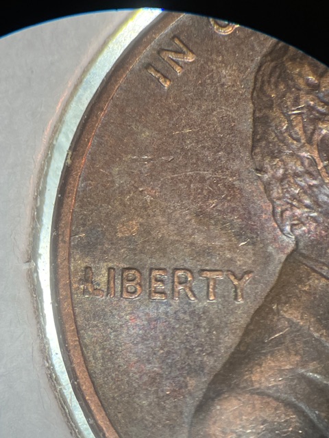 Lincoln-Cents-1987---Strange-Line--Over-Lincoln-Head-
